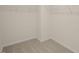 Empty walk-in closet providing spacious storage at 100 Reagan Crest Dr, Clayton, NC 27520