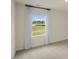 A well-lit window with white trim and curtains, offering views of the outside at 100 Reagan Crest Dr, Clayton, NC 27520