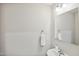 A well-lit half bath featuring a modern sink and fixtures at 1004 Summer Mist Ln, Durham, NC 27704