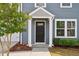Close up of the front door and entrance to the home at 1004 Summer Mist Ln, Durham, NC 27704