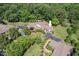 An aerial shot of the home shows the well-manicured landscaping and lush surroundings at 104 Cedar Ridge Way, Durham, NC 27705