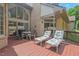 Backyard deck area with dining and lounge seating, showcasing the home's exterior and lush landscaping at 104 Cedar Ridge Way, Durham, NC 27705