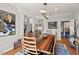 Spacious dining room with wood floors, modern lighting and bright view at 104 Cedar Ridge Way, Durham, NC 27705