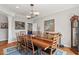 Charming dining area features a view to the exterior patio space at 104 Cedar Ridge Way, Durham, NC 27705