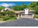 Stunning brick home with a two-car garage and lush landscaping at 104 Cedar Ridge Way, Durham, NC 27705