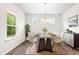 Elegant dining room with contemporary table set, accentuating the home's modern aesthetic at 107 Altair Ln, Sanford, NC 27330