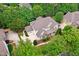Aerial view showcasing the manicured lawn, landscaping, and design of this two-story home at 10909 Grand Journey Ave, Raleigh, NC 27614