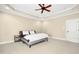 Bedroom with neutral decor, a ceiling fan, and great lighting at 10909 Grand Journey Ave, Raleigh, NC 27614