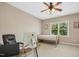 Bedroom featuring a work space and a twin bed near the window at 10909 Grand Journey Ave, Raleigh, NC 27614