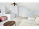 Lofted room with light blue walls, a sofa, coffee table, and a beanbag chair at 10909 Grand Journey Ave, Raleigh, NC 27614