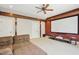 Cozy media room features a projector, large screen, and comfortable seating for ultimate movie enjoyment at 10909 Grand Journey Ave, Raleigh, NC 27614