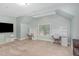 Bright bedroom with built-in desks, plush carpet, and cozy atmosphere at 1138 Bexley Hills Bnd, Apex, NC 27502