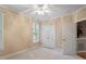 Bedroom showcases a double closet, large window, plush carpet, and access to an additional room at 122 Barringer Dr, Garner, NC 27529
