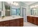 Elegant primary bathroom with dual vanity, soaking tub, and separate shower for a luxurious retreat at 122 Barringer Dr, Garner, NC 27529