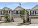 Attractive townhome with a two-car garage, neat landscaping, and pleasing curb appeal at 129 Explorer Dr # 256, Morrisville, NC 27560