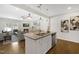 Spacious open kitchen with a granite island, stainless steel appliances, and a view of the living area at 129 Explorer Dr # 256, Morrisville, NC 27560