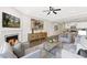 Inviting living room featuring a fireplace, modern furnishings, and an open layout connecting to the kitchen at 129 Explorer Dr # 256, Morrisville, NC 27560