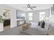 Serene main bedroom boasting ample natural light, plush carpet, and an ensuite bathroom at 129 Explorer Dr # 256, Morrisville, NC 27560