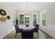 Bright dining area with a marble table set and view to the outdoors at 1325 Mackinaw Dr, Wake Forest, NC 27587