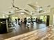 Community gym with modern exercise equipment and abundant natural light in a spacious area at 1325 Mackinaw Dr, Wake Forest, NC 27587
