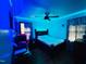Bedroom featuring a ceiling fan and stylish blue LED accent lighting at 1337 Maple St, Rocky Mount, NC 27803