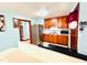 Efficient kitchen with stainless steel appliances and warm wood cabinets at 1337 Maple St, Rocky Mount, NC 27803