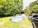 Backyard featuring a well-maintained above ground pool and a large lush backyard at 1337 Maple St, Rocky Mount, NC 27803