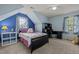 Attic bedroom featuring playful decor, plush carpet, and ample natural light from the large windows at 15 Smoketree Ct, Durham, NC 27712