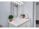 Bathroom featuring a white vanity with sink, a large mirror, and good lighting at 1516 Greys Mill Rd, Rocky Mount, NC 27804