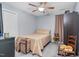 Bedroom with carpet, ceiling fan, and closet, offering a comfortable retreat at 1516 Greys Mill Rd, Rocky Mount, NC 27804