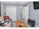 Cozy living room with grey walls, white doors, and a plush couch perfect for relaxation at 1516 Greys Mill Rd, Rocky Mount, NC 27804