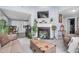 Inviting living room featuring a fireplace, mounted TV, and stylish decor at 1516 Greys Mill Rd, Rocky Mount, NC 27804
