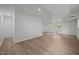 Open basement featuring laminate flooring, recessed lighting, and fresh white walls at 1713 Elder Ct, Burlington, NC 27215