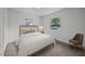 Bright bedroom features neutral tones, natural light, and carpet at 1713 Elder Ct, Burlington, NC 27215