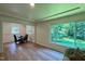 Bright dining room with natural light and open layout next to green outdoor view at 1713 Elder Ct, Burlington, NC 27215