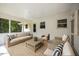 Comfortable screened porch with wicker seating, a perfect space for outdoor relaxation at 1713 Elder Ct, Burlington, NC 27215