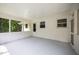 Spacious screened porch with neutral colors at 1713 Elder Ct, Burlington, NC 27215