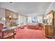 Spacious primary bedroom boasts a fireplace, sitting area, and ample closet space at 1913 Fawndale Dr, Raleigh, NC 27612