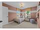 Serene bedroom bathed in natural light, boasting warm colors and comfortable furnishings at 215 Faith Avenue, Sanford, NC 27330