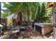 Backyard with an outdoor grilling area, seating, and shade trees; perfect for summer gatherings at 2302 Fordcrest Dr, Apex, NC 27502
