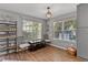 Bright dining room with hardwood floors, decorative lighting and views of the backyard at 2302 Fordcrest Dr, Apex, NC 27502