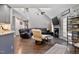 Spacious living room with vaulted ceilings, fireplace, hardwood floors, and comfortable seating at 2302 Fordcrest Dr, Apex, NC 27502