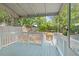 Back porch overlooking a green backyard at 2322 Stroller Ave, Durham, NC 27705
