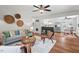 Open-concept living room leading to kitchen and dining area, great for entertaining at 2322 Stroller Ave, Durham, NC 27705