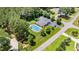 Aerial view showcasing a community pool with lounge area and ample parking at 240 Oak Grove Church Rd, Youngsville, NC 27596
