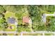 Aerial view of a neighborhood with tree-lined streets and well-maintained homes at 240 Oak Grove Church Rd, Youngsville, NC 27596