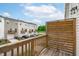 Cozy wooden balcony featuring railing and privacy screen overlooking the community at 2539 Kasota Ln, Raleigh, NC 27610