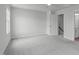 Carpeted bedroom features neutral walls and an ensuite bathroom at 2539 Kasota Ln, Raleigh, NC 27610