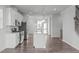 Spacious kitchen with white cabinetry, stainless steel appliances, and a center island at 2539 Kasota Ln, Raleigh, NC 27610