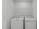 Dedicated laundry room with washer and dryer at 2539 Kasota Ln, Raleigh, NC 27610